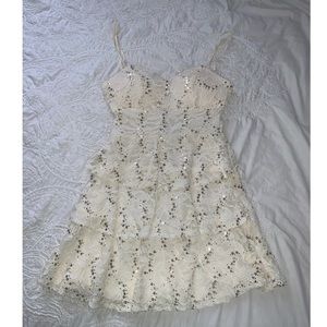 Cream ruffled dress, gold sequences